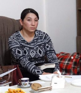 Armenia woman sitting