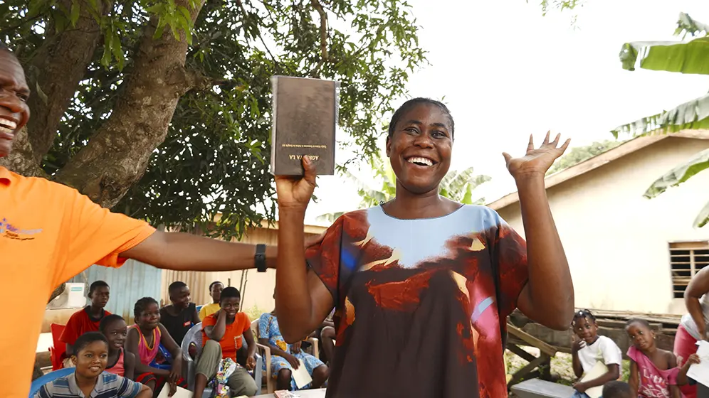 Smiling woman with her Bible